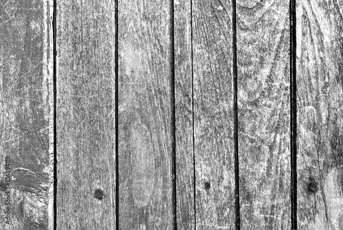 Vintage black and white wood table background in the beach. Retro and rustic grunge texture old wooden table. Close up. Top view.