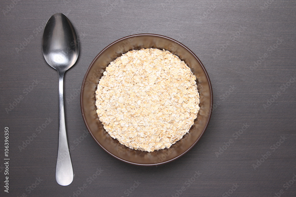 Oat flakes on table.healthy food concept. Oat flakes on table.healthy food concept.