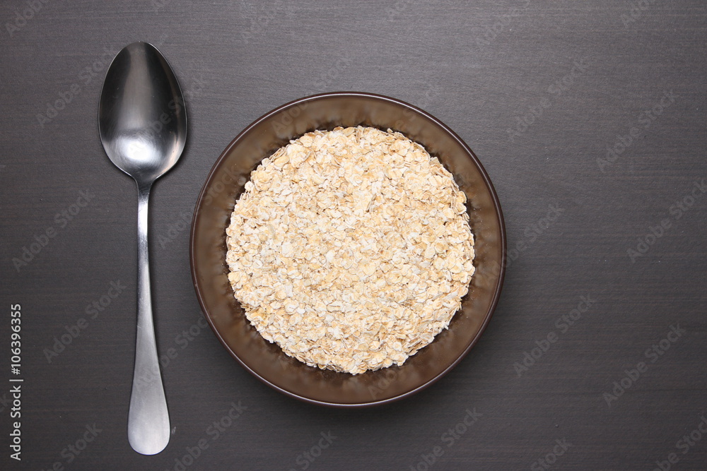 Oat flakes on table.healthy food concept. Oat flakes on table.healthy food concept.