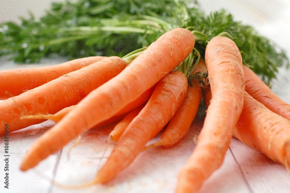 Carrot on the wooden background Carrot on the wooden background