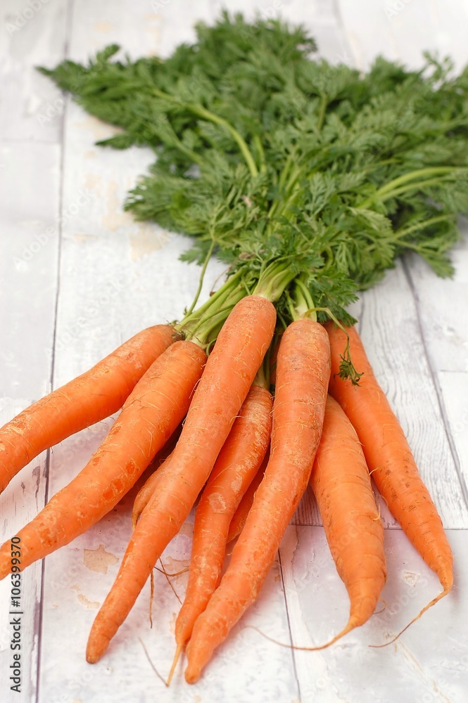 Carrot on the wooden background