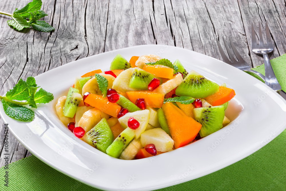 fruit salad in a wide rim square plate, close-up, top-view fruit salad in a wide rim square plate, close-up, top-view