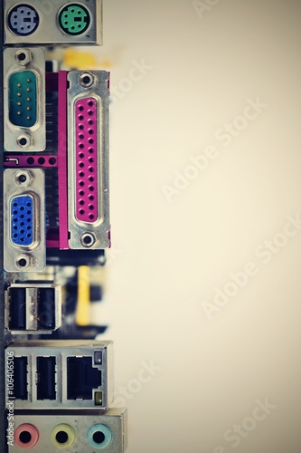 Rear view of the connectors on the motherboard of a personal computer. Isolated on a clean white background. Concept - electronics, internet and modern technology.