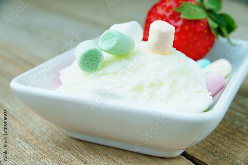 Ice cream sundae, strawberry and candies