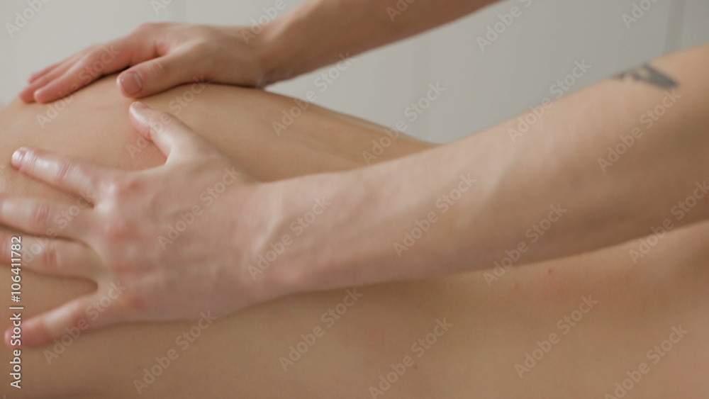 Client relaxing in massage at the spa Client relaxing in massage at the spa