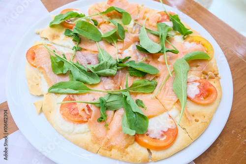 Fresh salmon ham pizza