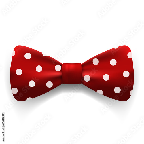 Red polka dot bow tie isolated on white background. Clothing acc