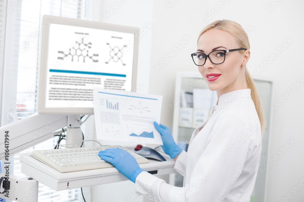 Skillful female researcher working with modern technology Skillful female researcher working with modern technology