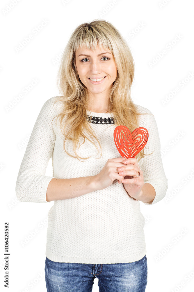 Valentines woman holding heart smiling happy. Love concept with happy female model isolated on white background. Valentines woman holding heart smiling happy. Love concept with happy female model isolated on white background.