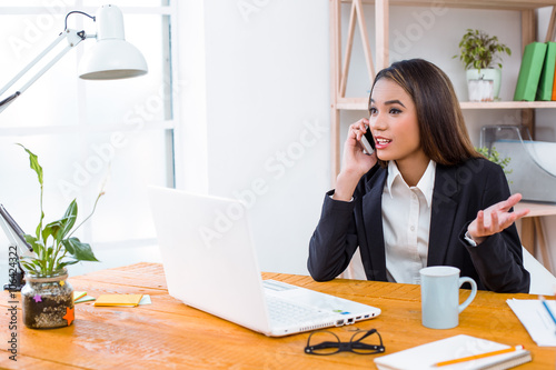 Nice photo of business woman in office © Friends Stock