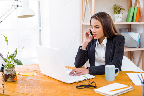 Nice photo of business woman in office