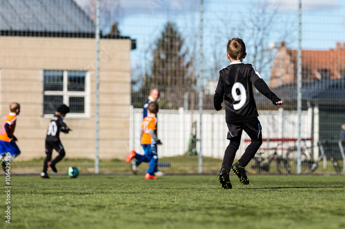 Young boy during soccer match © Mikkel Bigandt