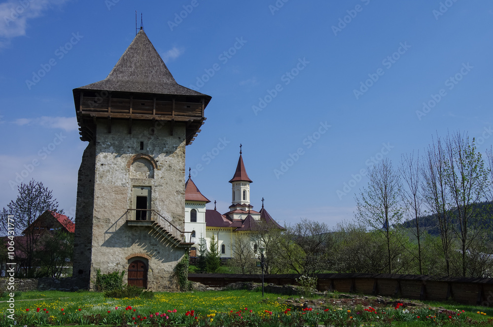 Tower from courtyard of Humor Monastery located in Gura Humorului,Romania, is one of the first of Moldavia's painted monasteries. Tower from courtyard of Humor Monastery located in Gura Humorului,Romania, is one of the first of Moldavia's painted monasteries.