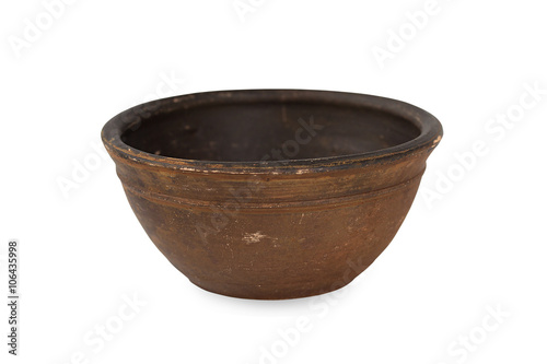 Old ceramic bowl on a white background.