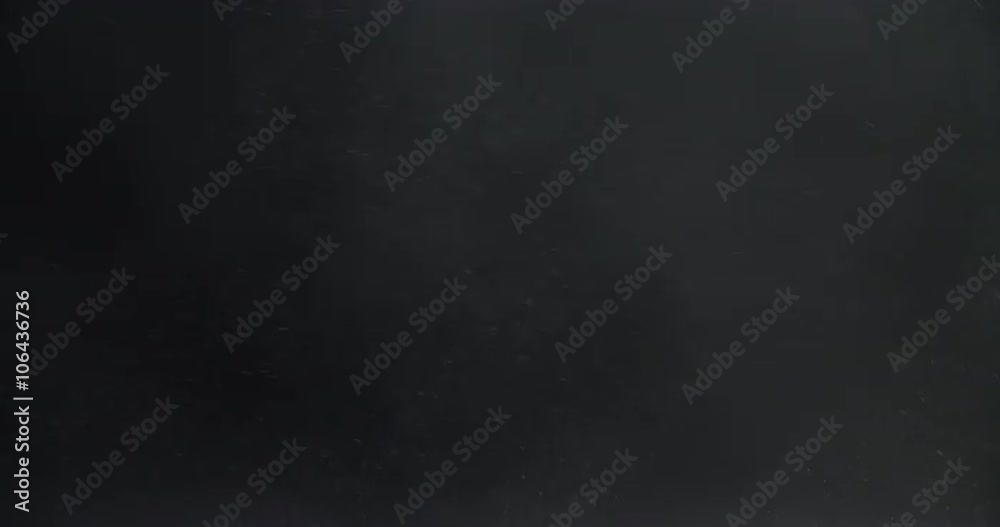 small particles like dust and smoke impact and flow from below over black background slow motion, 4k prores footage shot in 60fps