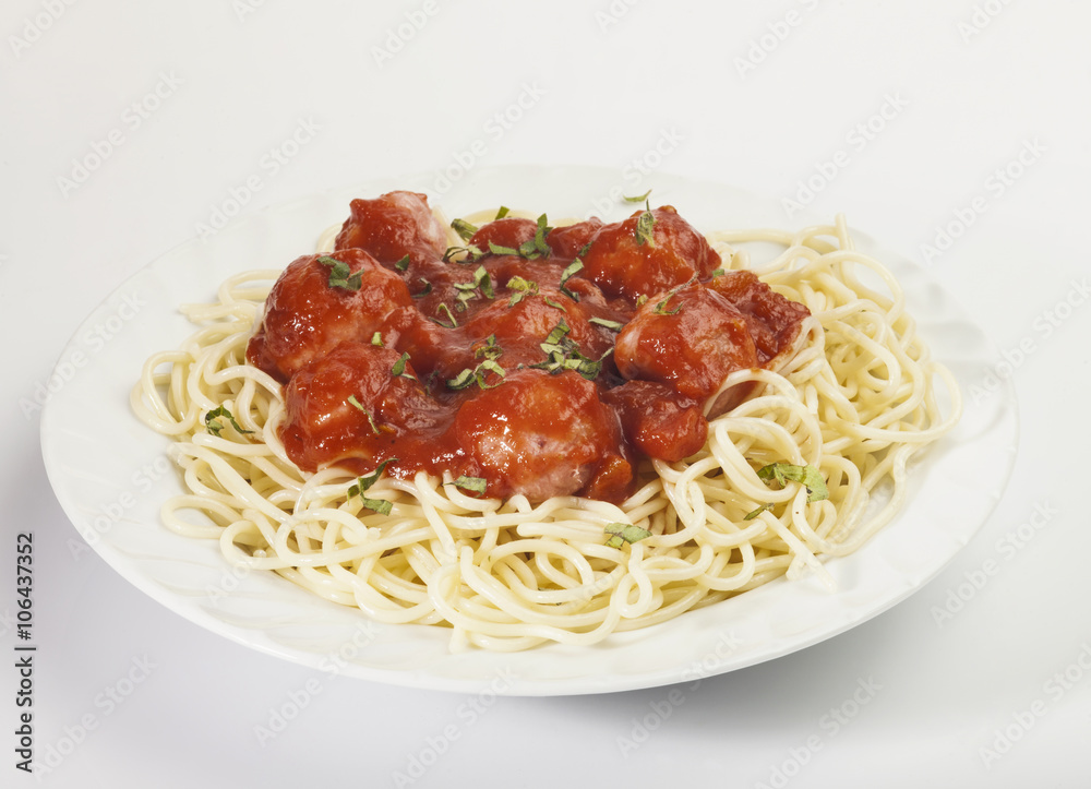 Spaghetti pasta with meatballs and tomato sauce