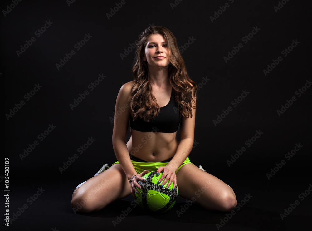 sexy half naked woman football player sitting on floor Stock Photo | Adobe  Stock