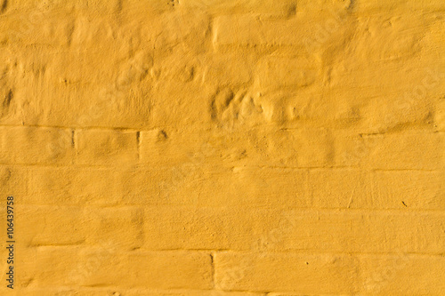 Brick and plaster background.