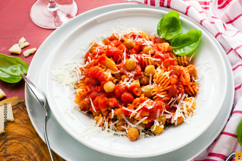 healthy Italian pasta with chickpeas and tomato sauce . parmesa healthy Italian pasta with chickpeas and tomato sauce . parmesa