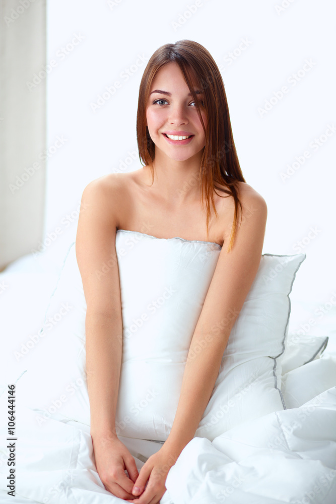 Portrait of beautiful woman on bed at bedroom Portrait of beautiful woman on bed at bedroom