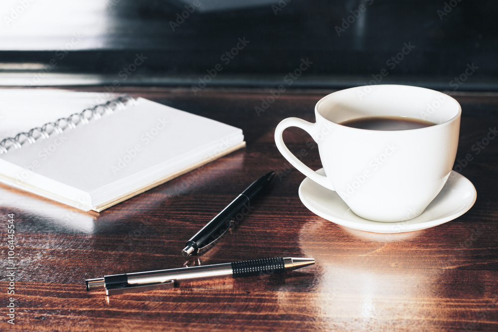 Desktop with coffee and notepad Desktop with coffee and notepad