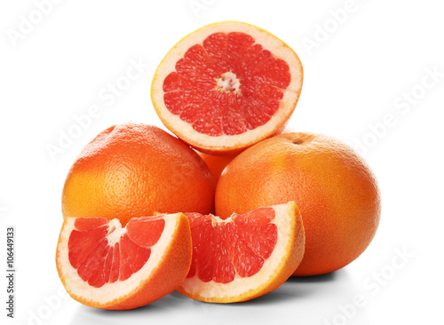 Pile of grapefruits isolated on white background