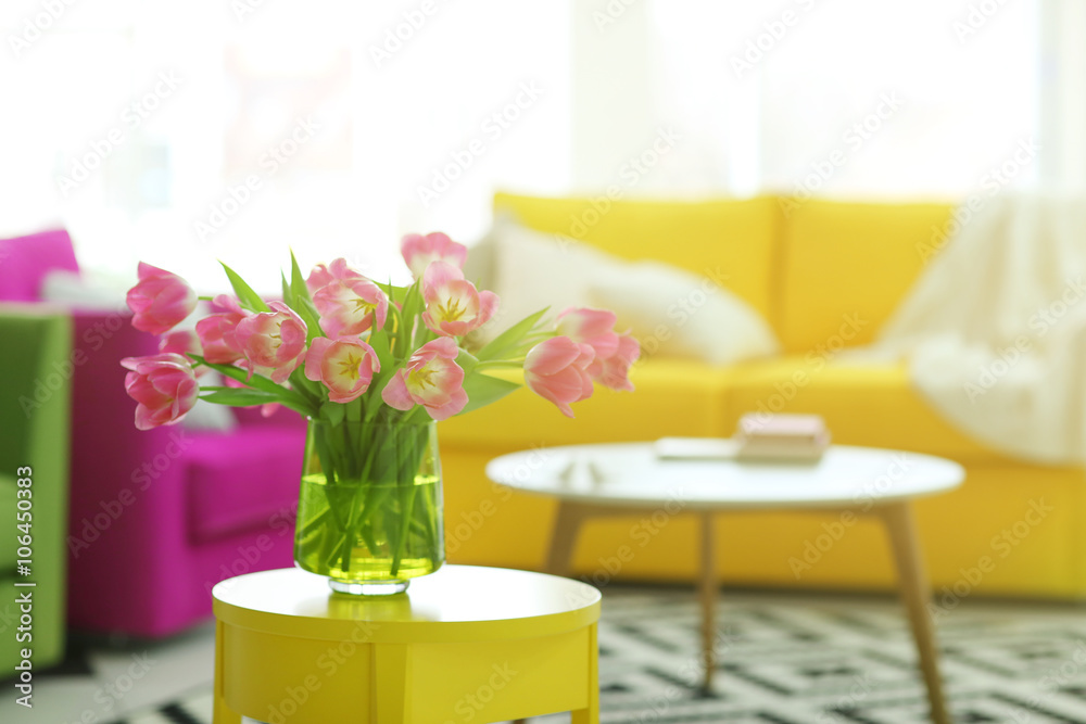 Fresh bouquet of tulips on a coffee table Fresh bouquet of tulips on a coffee table