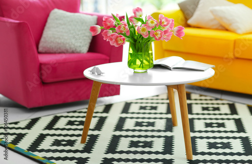 Fresh bouquet of tulips on a coffee table