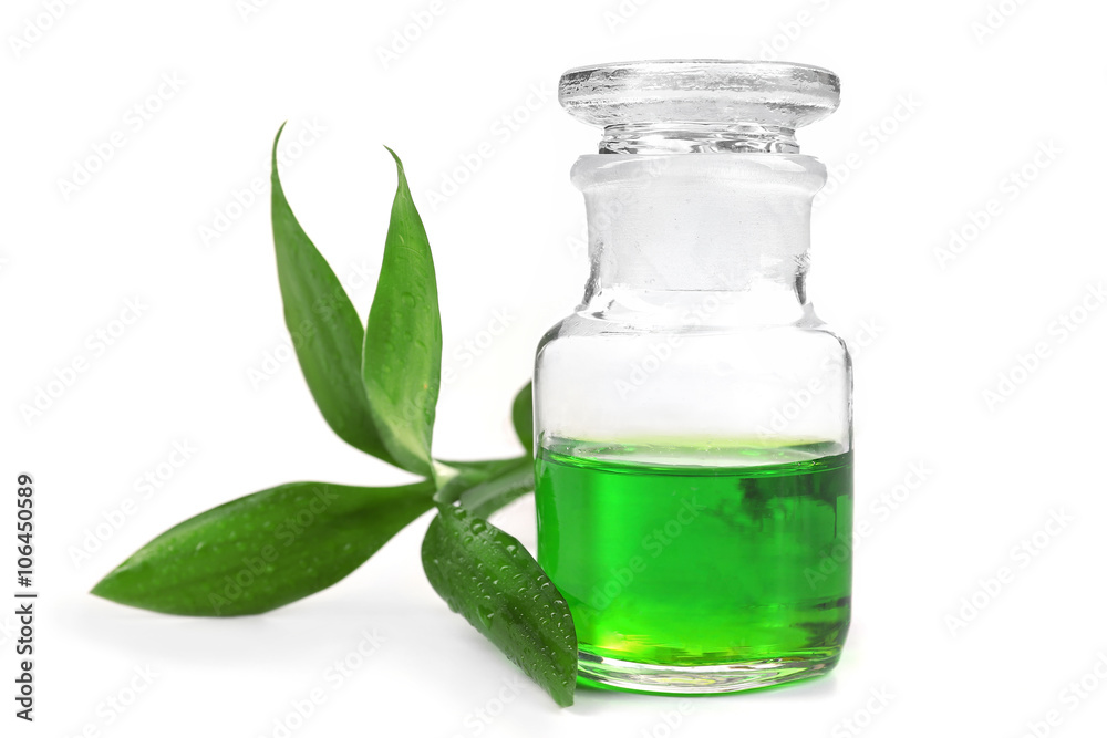 Bottle of tea oil, isolated on white Bottle of tea oil, isolated on white