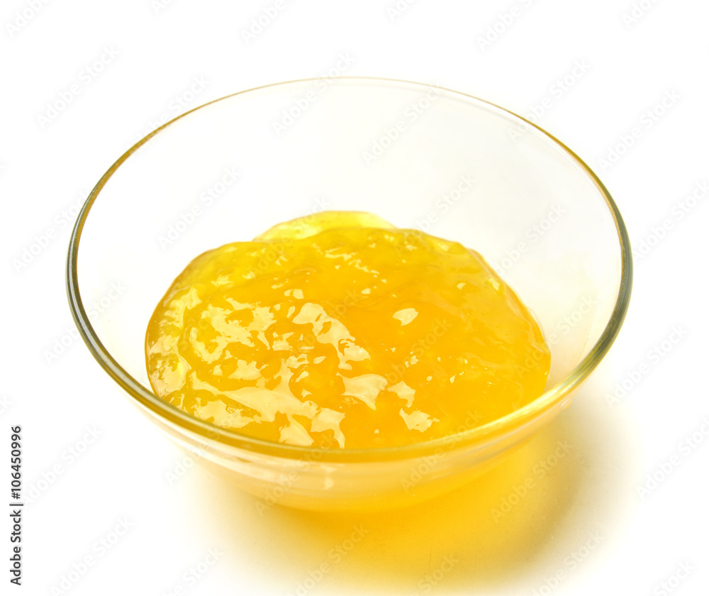 Sweet pineapple jam in the transparent glass bowl Sweet pineapple jam in the transparent glass bowl