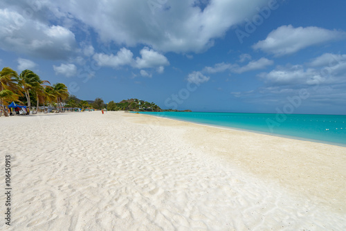 Tropical beach at Antigua island in Caribbean with white sand  t