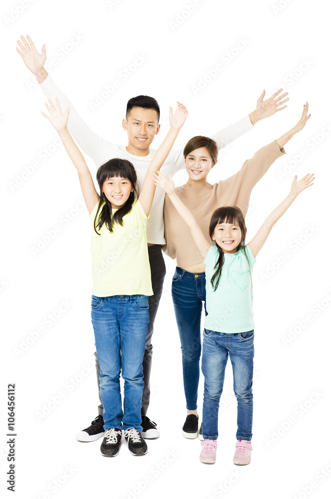 Happy Attractive Young Family standing together Happy Attractive Young Family standing together