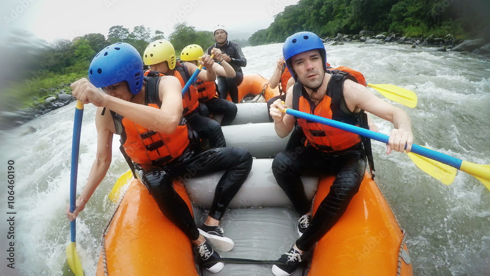 Experience the thrill of whitewater rafting as senior and adult men row with precision,captured on camera with immersive sound.