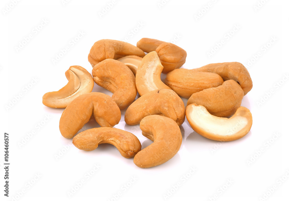 Roasted Salted Cashews on white background. Roasted Salted Cashews on white background.