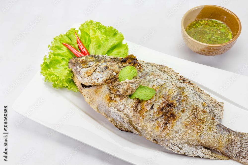 fish grilled with salt on background,Thai food fish grilled with salt on background,Thai food
