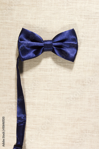 Bow tie on a linen napkin photo