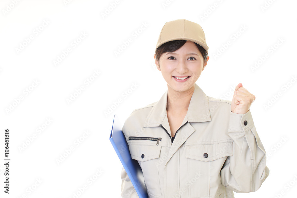 ガッツポーズの女性作業員 ガッツポーズの女性作業員