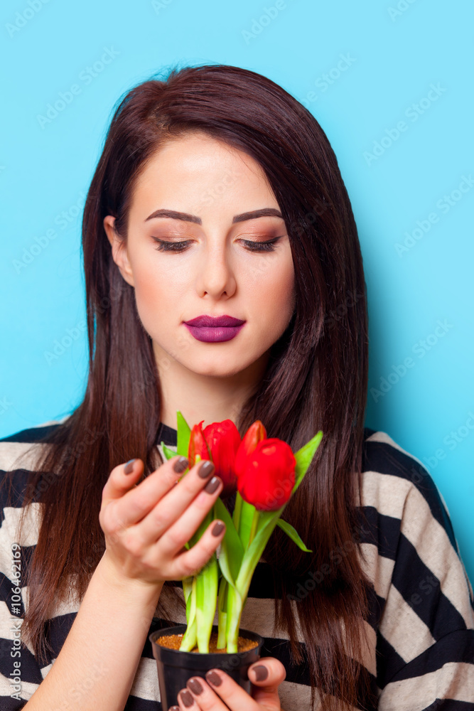 portrait of a young woman with tulips portrait of a young woman with tulips