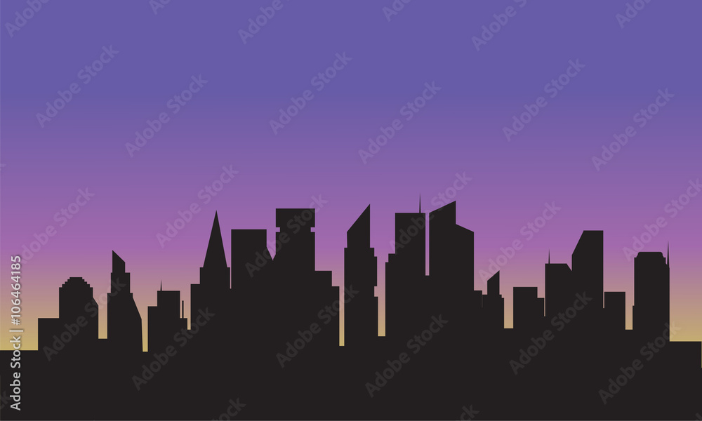 Silhouette of city with purple sky