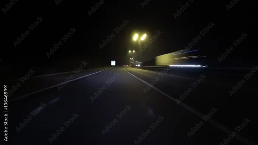 Time-lapse of driving on the Northamptonshire A14 dual carriageway road through roadworks at night. Time-lapse of driving on the Northamptonshire A14 dual carriageway road through roadworks at night.