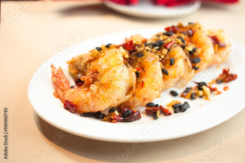 Fried shrimp with spices on dish