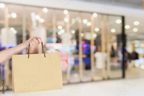 Woman with shopping bag in shopping mall © Piman Khrutmuang