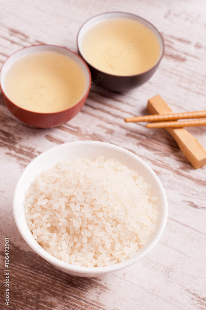 rice, green tea and chopsticks for sushi