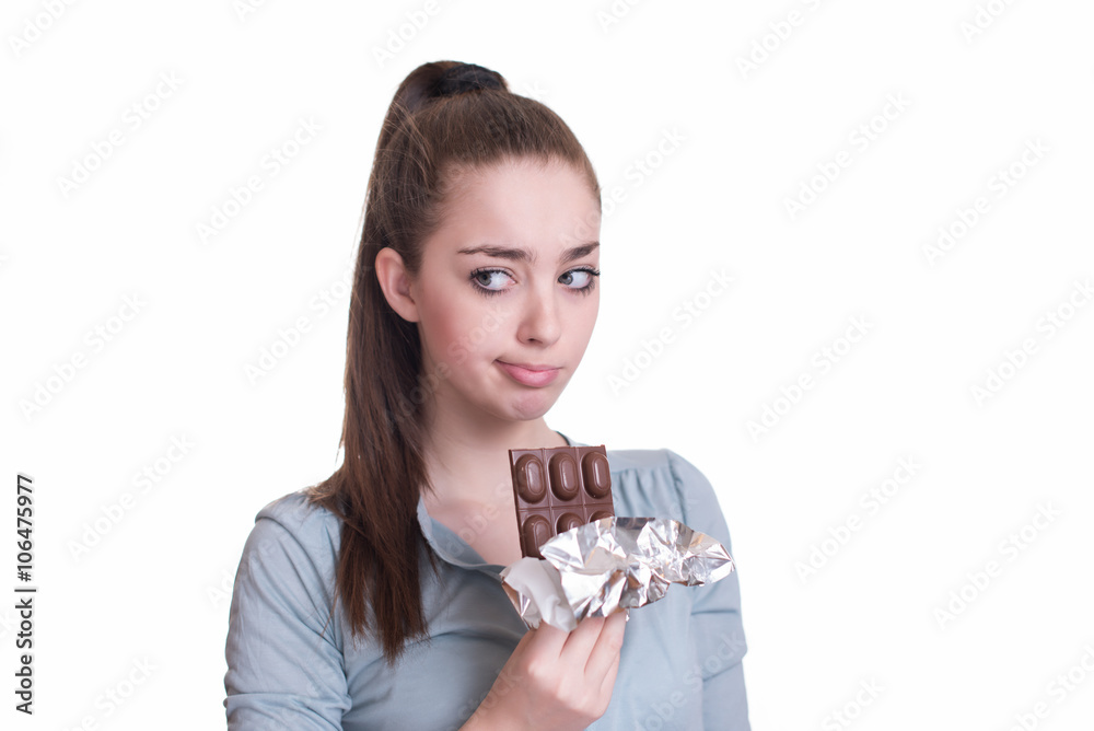 Sad young woman tired of diet restrictions craving sweets chocol Sad young woman tired of diet restrictions craving sweets chocol