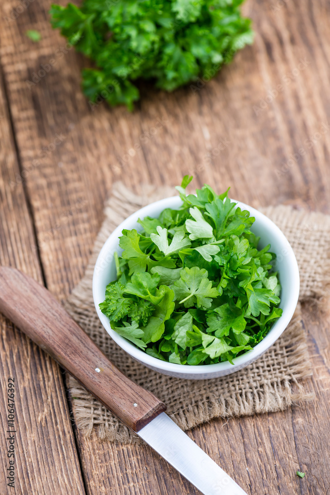 Parsley (on wooden background) Parsley (on wooden background)