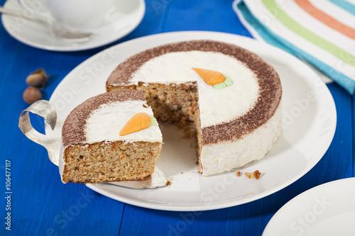 Carrot cake and piece on a plate