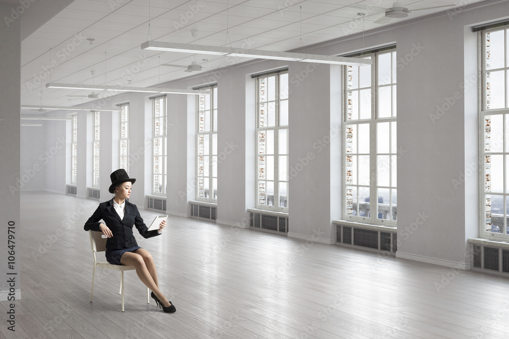 Fototapeta premium Businesswoman on chair in office
