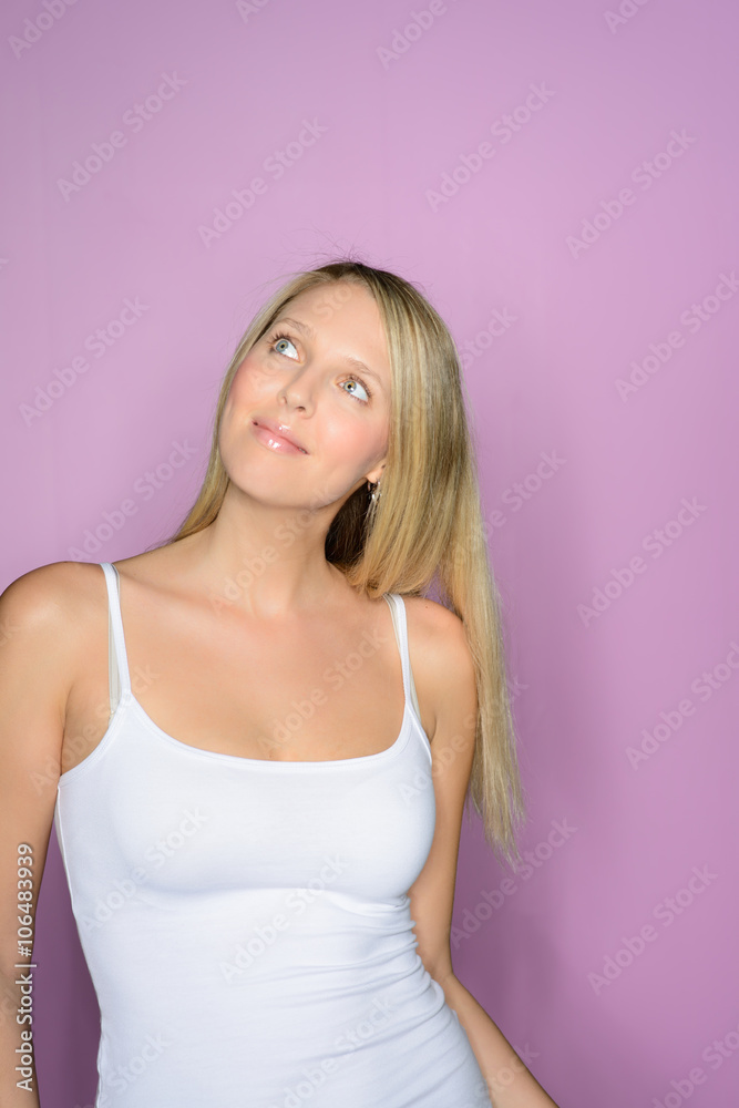 beautiful blonde woman in white tshirt smiles beautiful blonde woman in white tshirt smiles