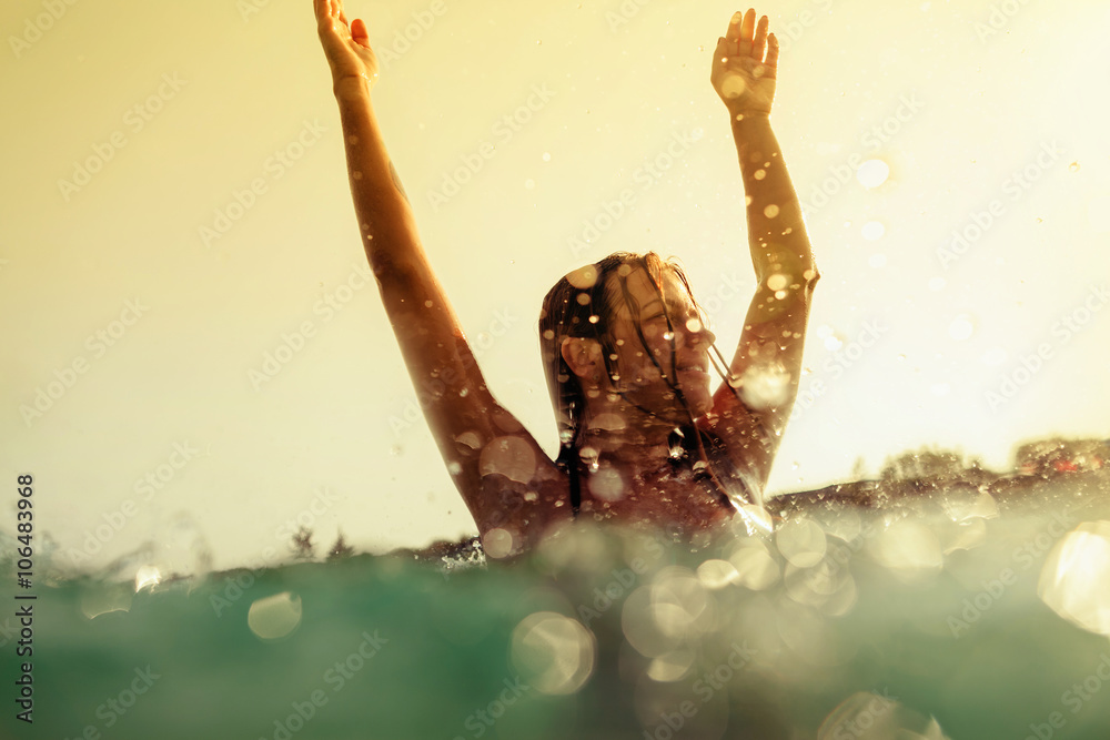 Fototapeta premium sexy bikini girl swim sea waves splash vintage tone