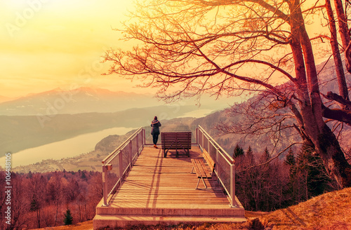 woman enjoying beautiful view on a high plattform-Bergfried 02 photo